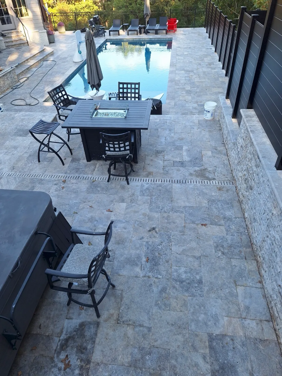 Modern horizontal Sleek Fence aluminum installation enclosing pool deck in Roswell GA