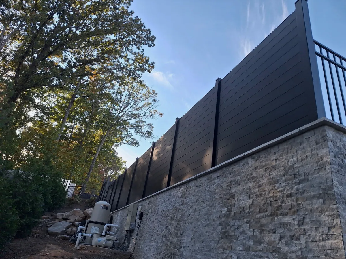 Roswell pool deck enclosed by contemporary horizontal aluminum Sleek Fence