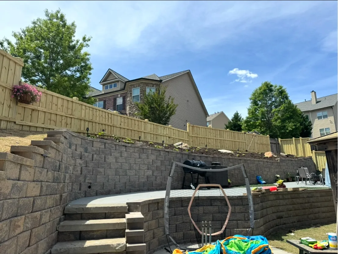 Substantial six-foot capped board-on-board wood privacy fence with 6x6 dado posts in Cumming GA
