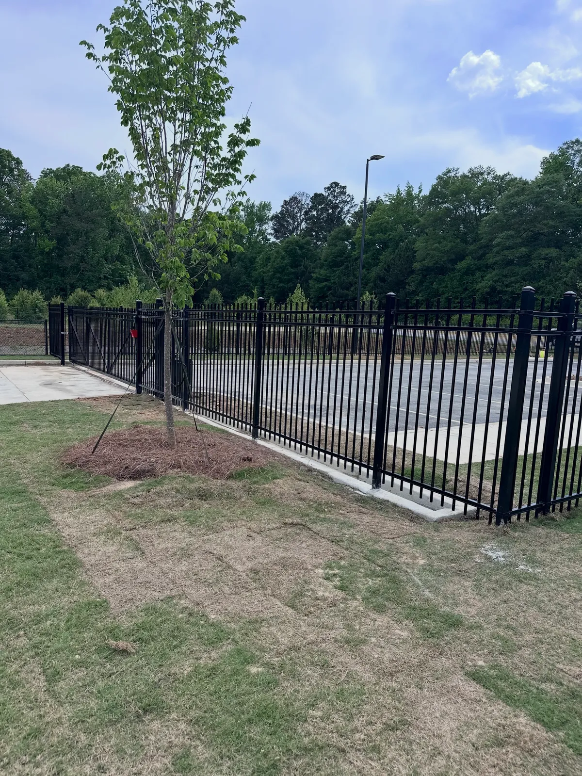 Commercial heavy-duty perimeter fence installation at Fulton County municipal fire station in Fairburn