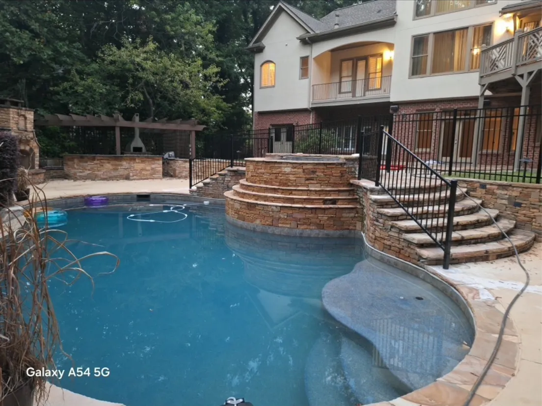 Black pool safety code aluminum fence and steps handrail in Cumming Georgia