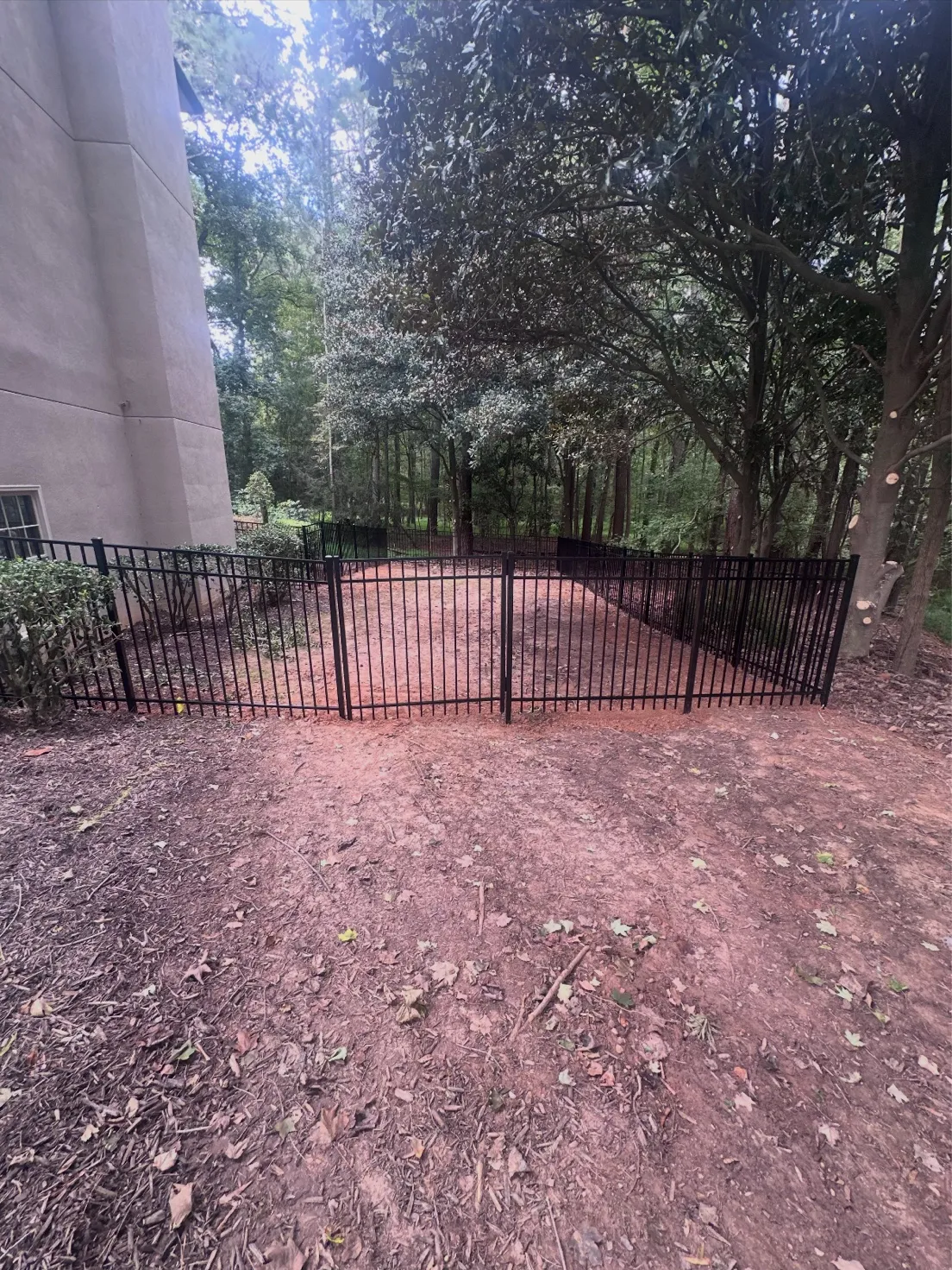 Five-foot flat-top black aluminum ornamental fence in private Johns Creek backyard